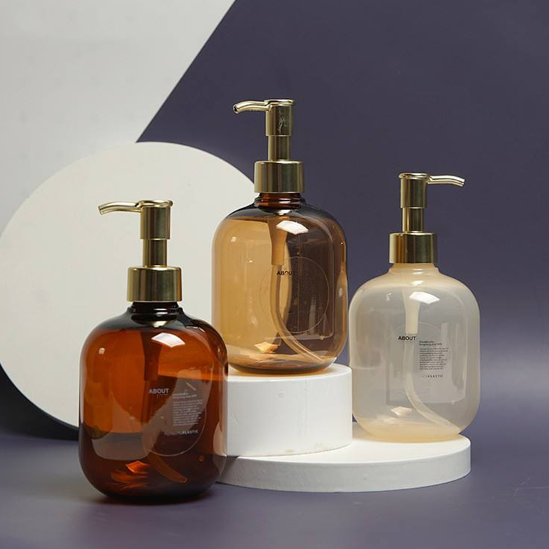 300ml 500ml PET plastic Chihlimbar rotund Balsam gol Sticla de loțiune de corp Aur PET Pompă de loțiune Flacon de șampon