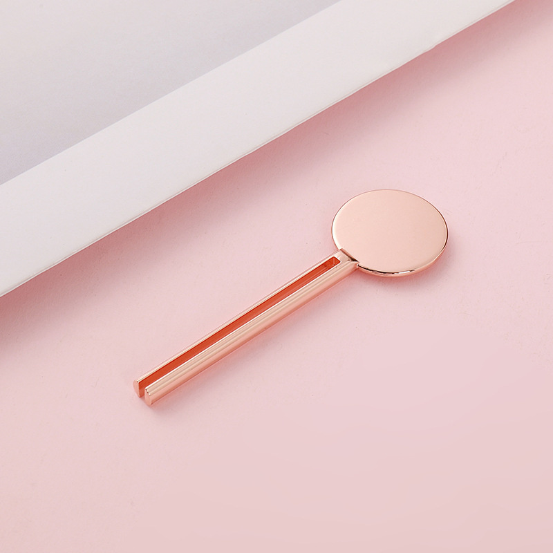 Cheie cosmetică în formă de storcator de tuburi de pastă de dinți cu rulare cheie cu dozator de suport Storcator de tuburi metalice Cheie cosmetică în formă de storcator de tuburi de pastă de dinți cu rulare cheie cu dozator de suport Storcator de tuburi metalice