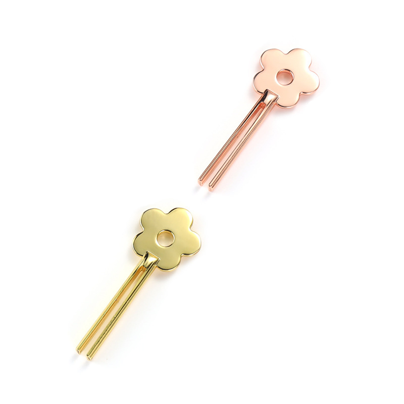 Storcător zâmbitor în formă de floare din aliaj de zinc Storcător zâmbitor în formă de floare din aliaj de zinc